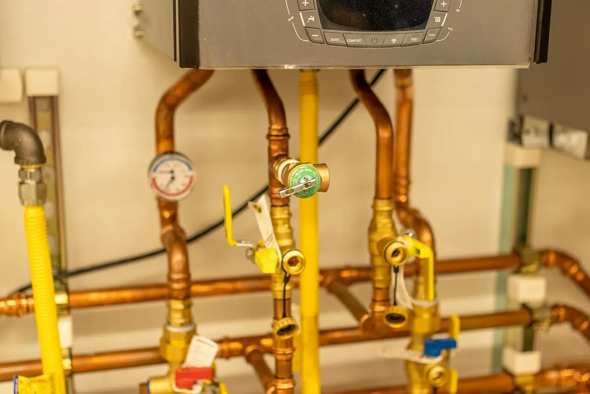 Licensed technician providing Backflow Prevention for a homeowner in Mineola